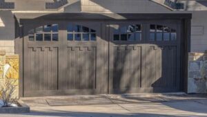 a pair of custom wood garage doors on home